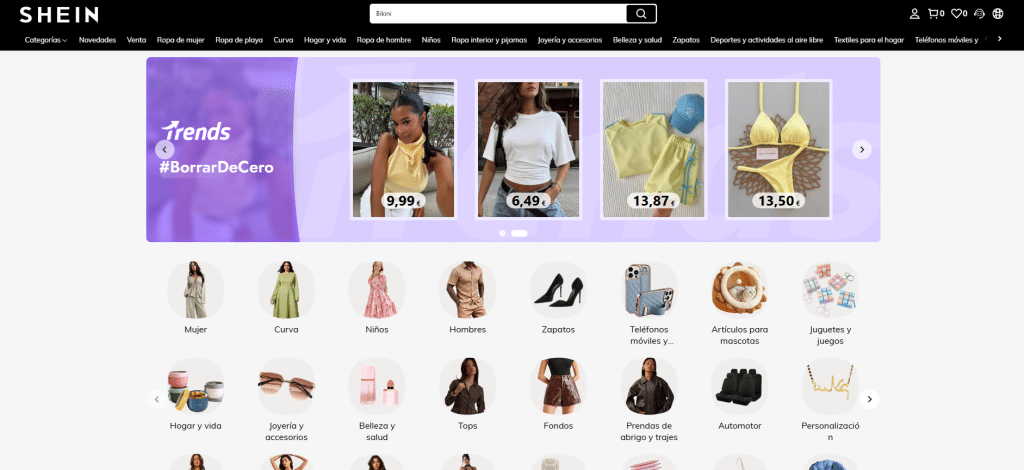 Página de inicio de SHEIN con diversas categorías de ropa femenina, masculina e infantil, con banners coloridos de ofertas y novedades de la colección actual.