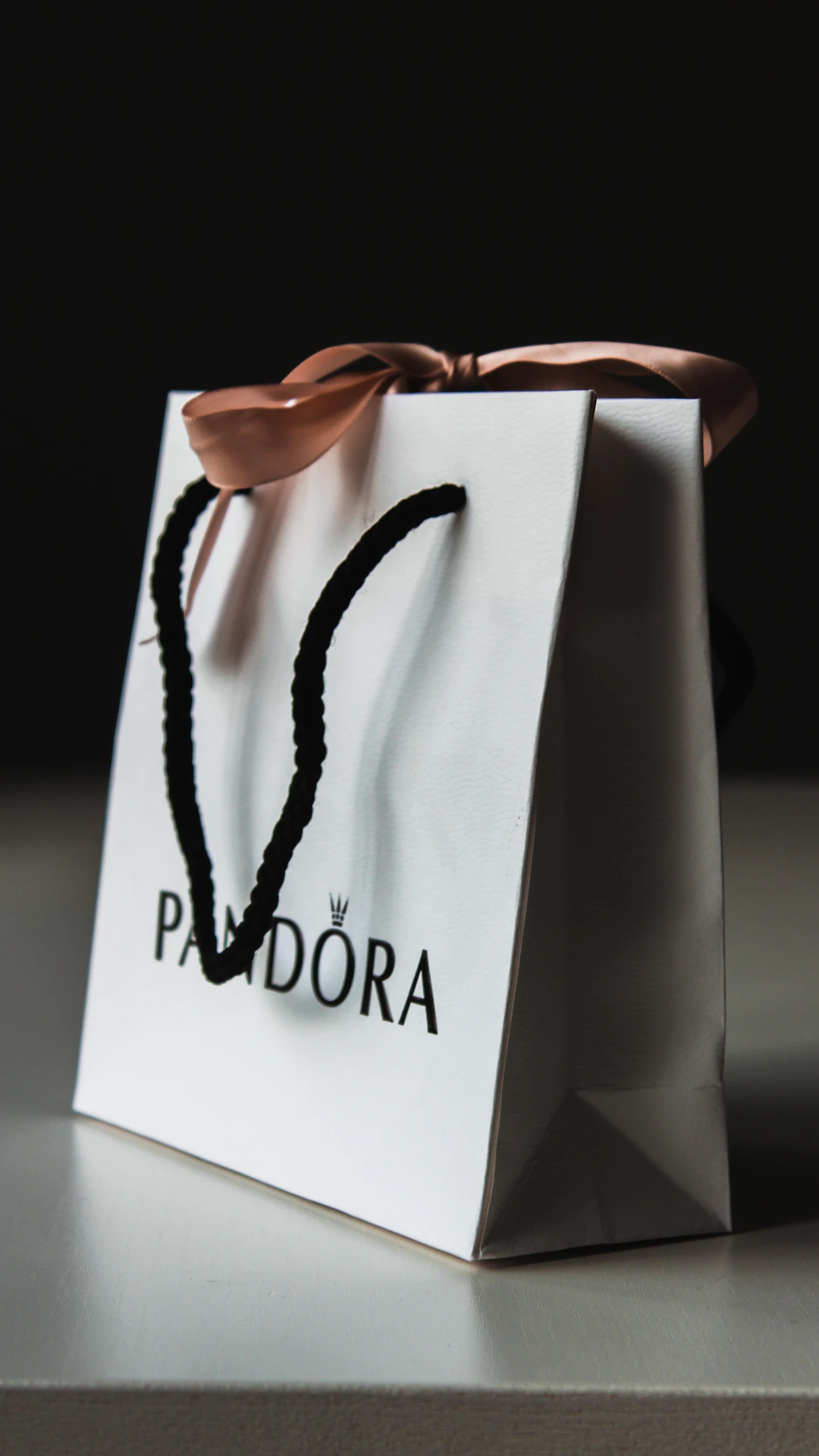 white Pandora shopping bag